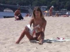 Nudist teen not shy about posing nude at the beach